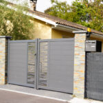 Aluminum design steel grey metal gate of modern suburb house entrance